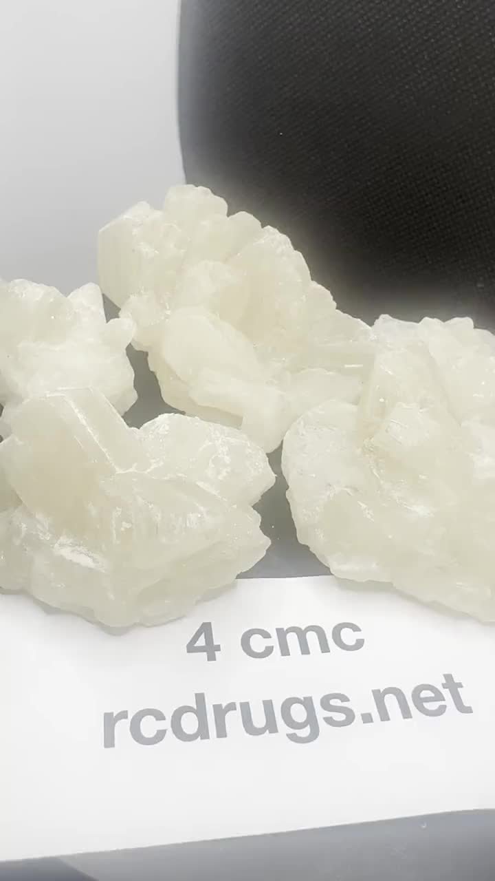 4-CMC crystals with a batch card.